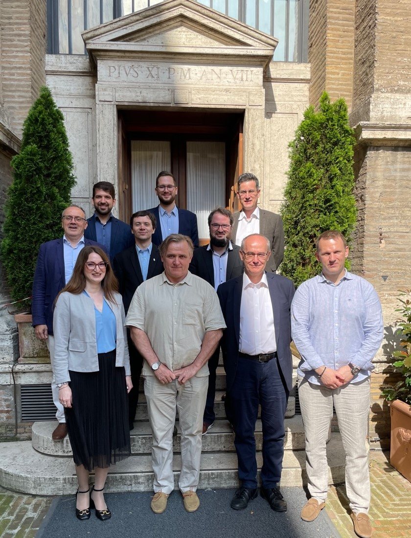 Members of the Research Group in front of the entrance of the Vatican Apostolic Archive